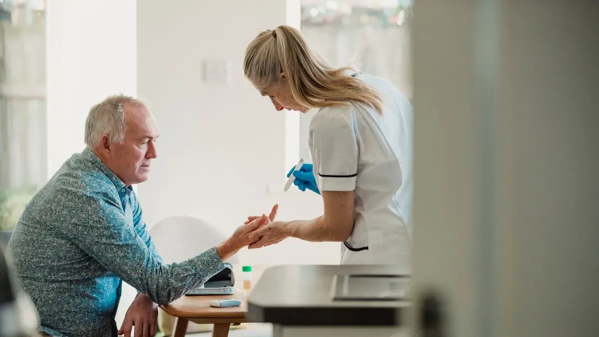 elderly man being assisted by a nurse