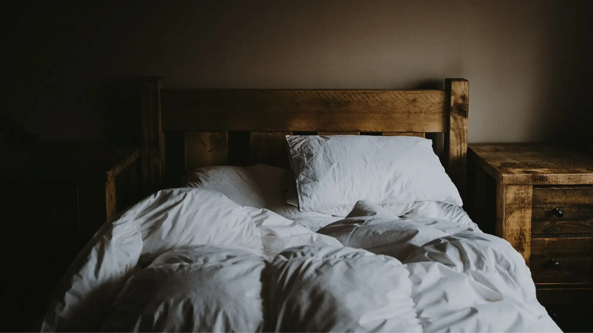 empty bed in a room