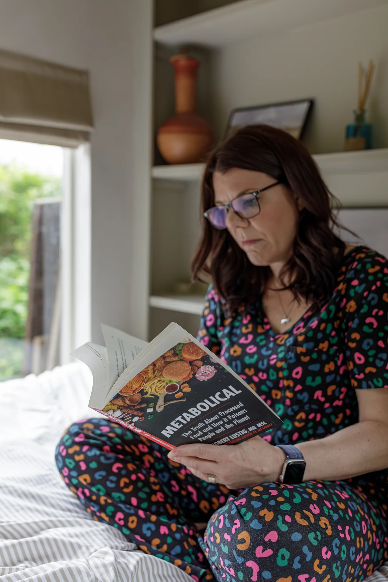 holly looking down at her book