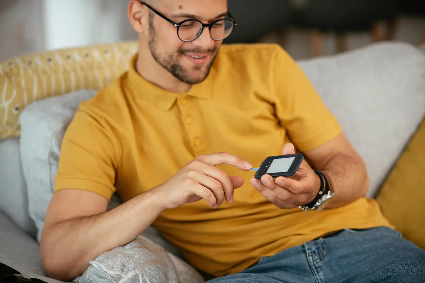 man reading about integral wellness on his phone