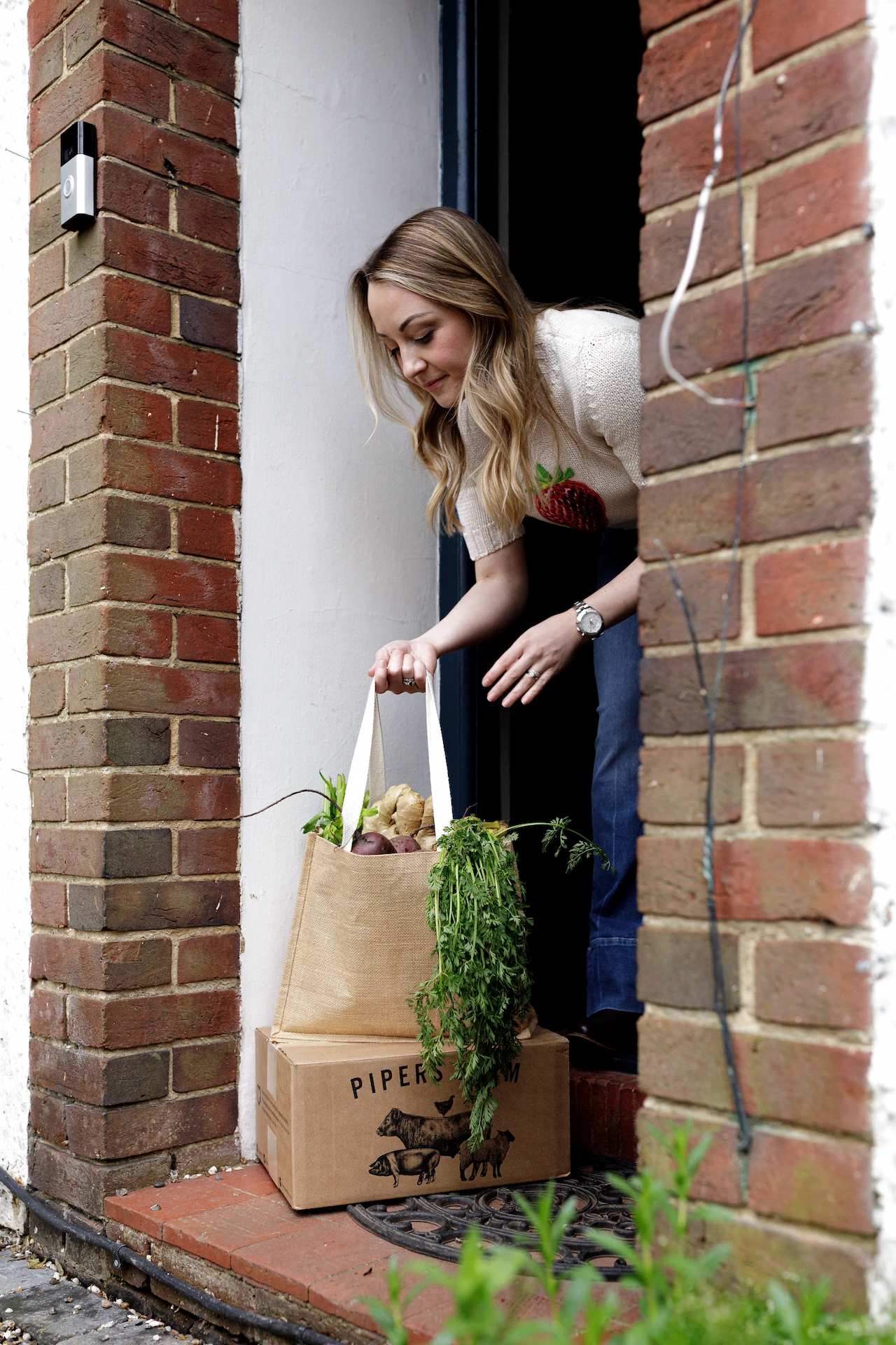 natalie collecting her delivery