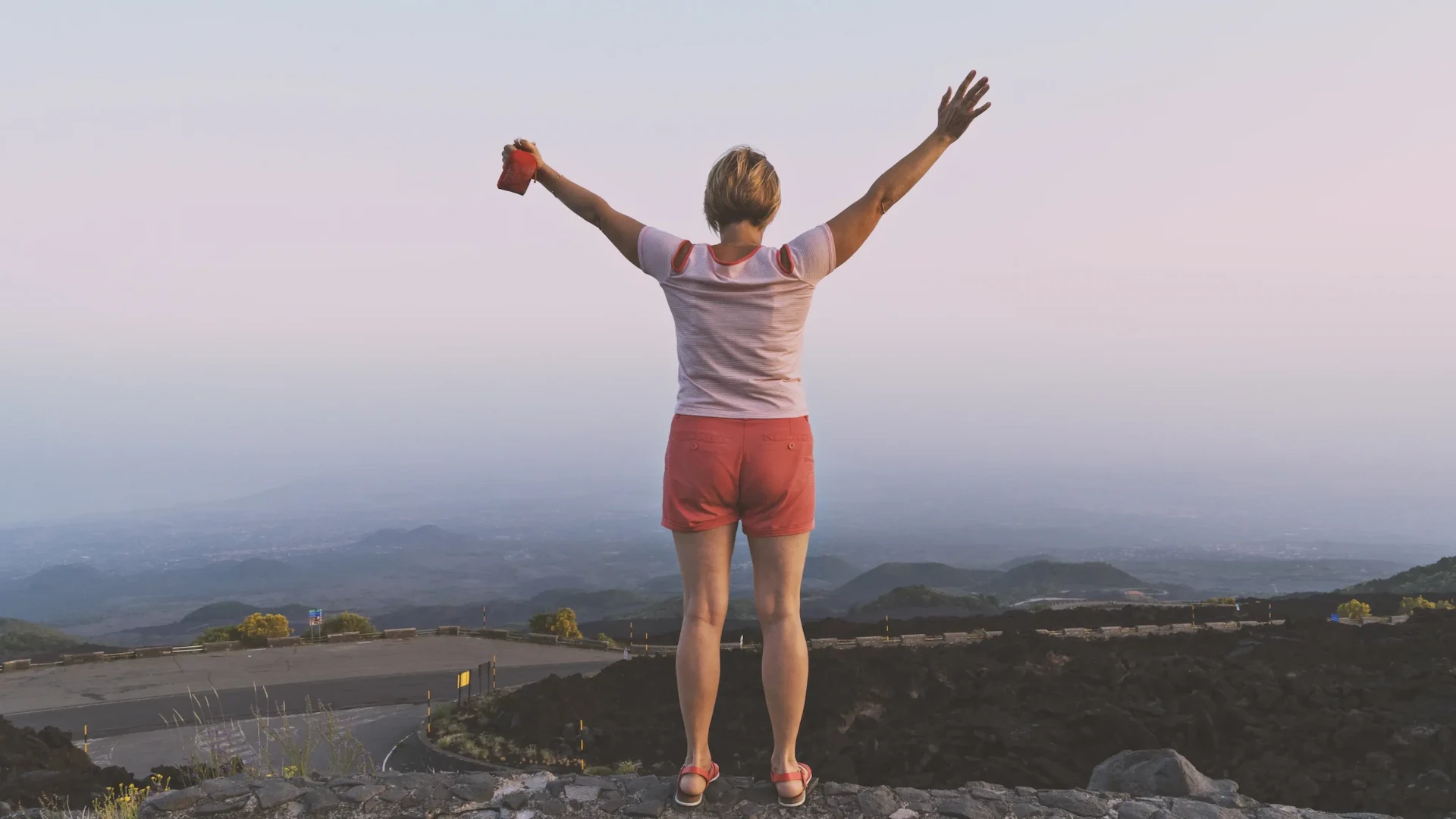 woman cheering outside