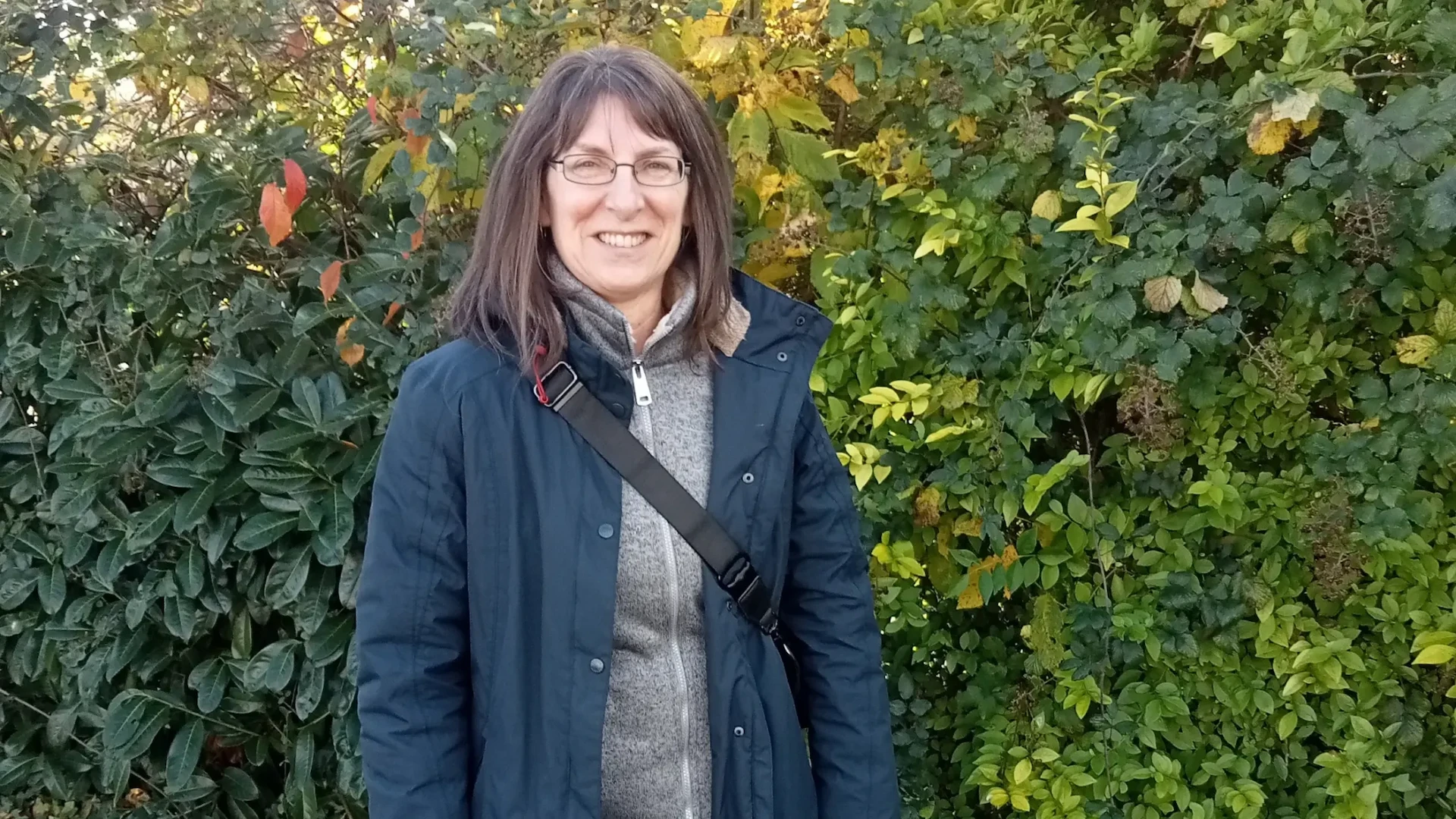 woman standing in a garden